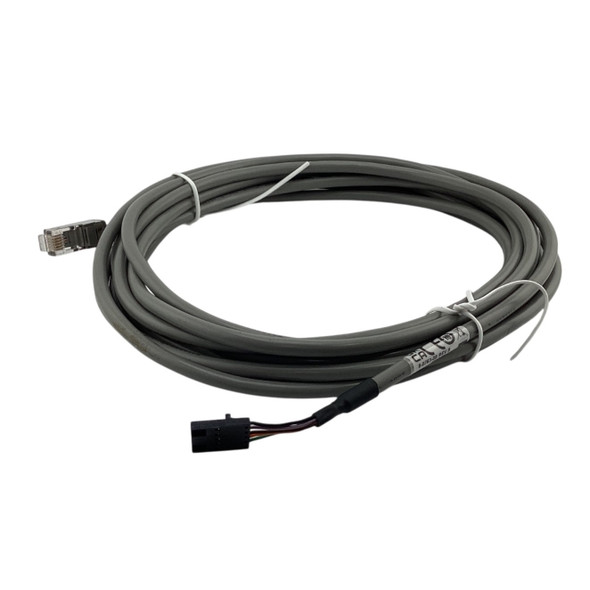 Alternate view of the coiled grey Datalogic 8-0763-08 cable against a white background, highlighting both connection ends and the clear specification label sleeve.