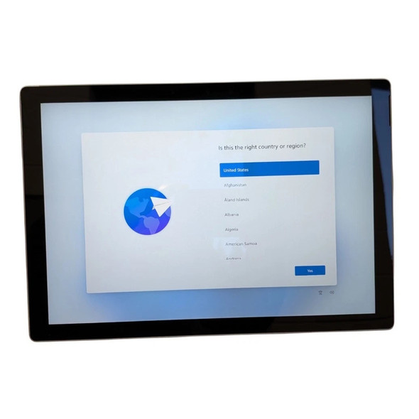 Front view of the Microsoft Surface Pro 7+ tablet powered on displaying the Windows initial setup screen.