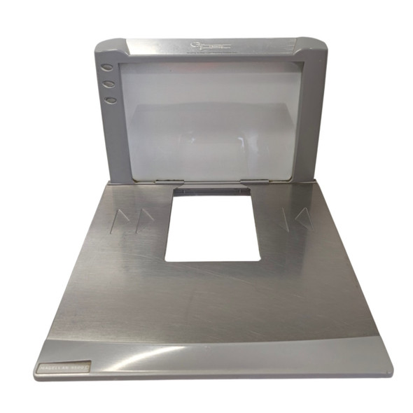 Top angled view of the PSC Magellan 9500 stainless steel weigh platter assembly featuring the horizontal scan window opening and vertical bonnet.