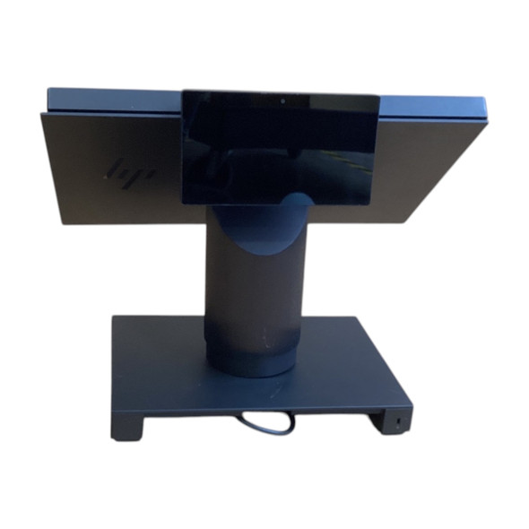 Rear-facing perspective of the fully assembled HP Engage One Pro terminal, highlighting the back of the main display panel, integrated secondary customer-facing display, and upright stand.