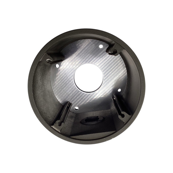 Top-down interior view of the Digital Watchdog DWC-BLJUNC junction box showing the hollow aluminum housing, mounting screw channels, and central cable access hole.
