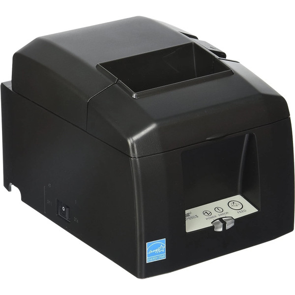 A side-angled perspective view of a Star Micronics TSP654IIBI2 thermal receipt printer in matte black.

The image shows the following external features:

Chassis: A sturdy, compact design with a hinged top cover for easy paper roll loading. The exit slot for printed receipts is located at the top front.

Controls and Indicators: A white control panel is recessed on the lower-right front face, featuring:

Power and Error LEDs: Clearly labeled indicator lights.

FEED Button: For manual paper advancement.

Power Switch: A black rocker-style power switch is located on the lower-left side near the base.

Branding: A blue and white Energy Star logo sticker is visible on the bottom-right corner of the front panel.

Connectivity Access: A small cutout at the bottom-rear corner allows for cable routing from the back interface panel.

The printer is photographed against a plain white background, emphasizing its functional and professional design for point-of-sale environments.
