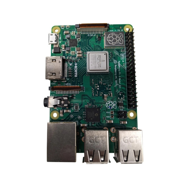 A top-down, full-frame studio shot of the top side of a green Raspberry Pi 3 Model B+ single-board computer. The circuit board is oriented vertically, showing its complex architecture of chips, connectors, and gold-plated mounting holes.

Core Components and Labeling
Processor: A prominent square Broadcom BCM2837B0 chip is centered, featuring a silver metal heat spreader for thermal efficiency.

Wireless Module: To the upper right of the processor, a silver metallic shield embossed with the Raspberry Pi logo houses the dual-band Wi-Fi and Bluetooth hardware.

Official Branding: White silk-screened text to the right of the processor reads "Raspberry Pi 3 Model B+" and "© Raspberry Pi 2017."

Connectivity and I/O
Top Edge: Contains a vertical DISPLAY ribbon cable connector.

Left Side: Features a micro-USB power input, a full-size silver HDMI port, a vertical CAMERA ribbon cable connector, and a black 3.5mm audio/composite video jack.

Bottom Edge: Includes a silver metallic RJ-45 Ethernet jack and two stacked pairs of dual USB 2.0 Type-A ports (totaling four ports) with silver housings stamped "GCT."

Right Side: A 40-pin GPIO male header strip with black pins runs along the entire length of the board, accompanied by a small 4-pin PoE header near the bottom.

Technical Details
The green PCB is populated with numerous small surface-mount components, including resistors and capacitors. Small white status indicator LEDs labeled "PWR" and "ACT" are visible in the upper-left corner. The entire unit is isolated against a clean, solid white background.