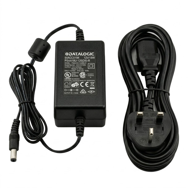 A full product view of the Datalogic 90ACC0194 AC power supply brick, showing the rectangular adapter unit with its printed regulatory label, an attached DC power cord ending in a barrel jack connector with an integrated ferrite core, and a separate bundled UK-style three-prong AC power mains cable, all isolated on a plain background.