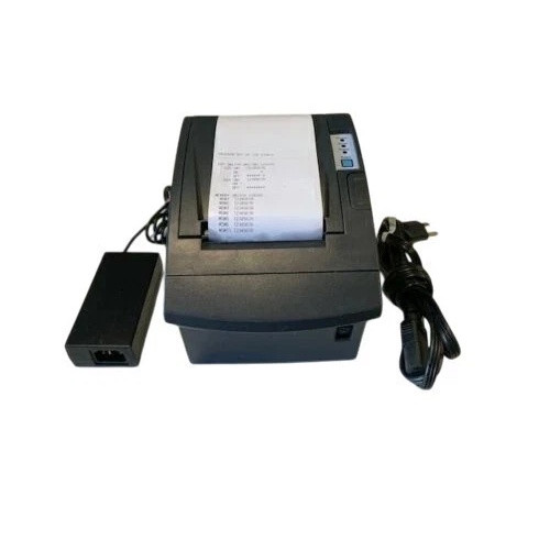 Front overhead view of a dark gray Bixolon SRP-350plusIII thermal receipt printer on a white background. A printed sample receipt extends from the top paper-feed slot. An external black power supply adapter sits to the left, and a bundled black AC power cable is displayed on the right.