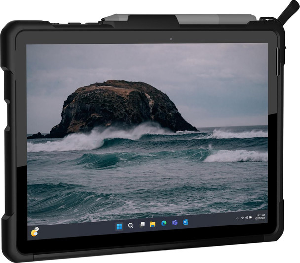A clean, front-facing view of a Microsoft Surface Go tablet enclosed in a heavy-duty, black UAG protective case. A stylus pen is securely docked along the top edge, and the tablet screen displays a Windows 11 desktop with a coastal rock and ocean wave wallpaper.