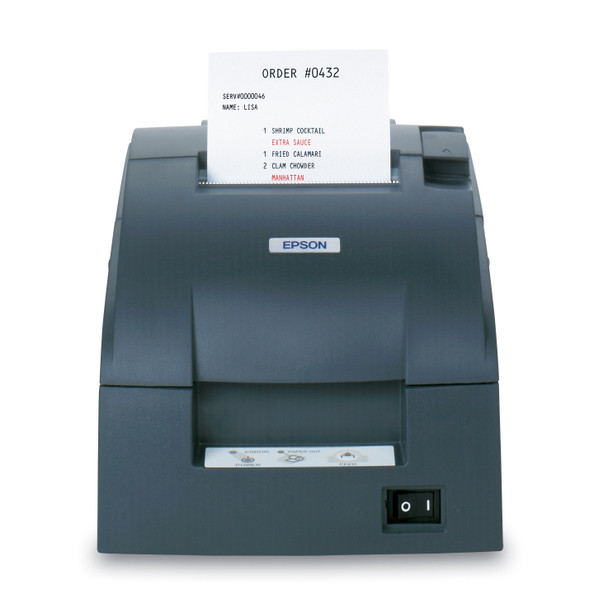 Front vertical perspective of the dark gray Epson TM-U220B Impact POS Receipt Printer (C31C514663) with a restaurant kitchen order ticket emerging from the top serrated cutter slot. The printed receipt clearly illustrates two-color capability, highlighting "EXTRA SAUCE" and "MANHATTAN" in bold red text amid black text. A status light console sits below beside a mechanical power switch.