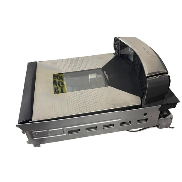 A high-angle right side view of the Datalogic Magellan 9804 medium-sized bi-optic scanner scale, showcasing the flush stainless steel platter with a dot-matrix texture pattern and the underlying metal chassis frame with side mounting slots.