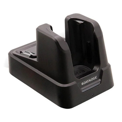 Angled three-quarter view of the Datalogic Skorpio X5 single charging cradle, highlighting its compact desktop design, device slot, and status indicator light.