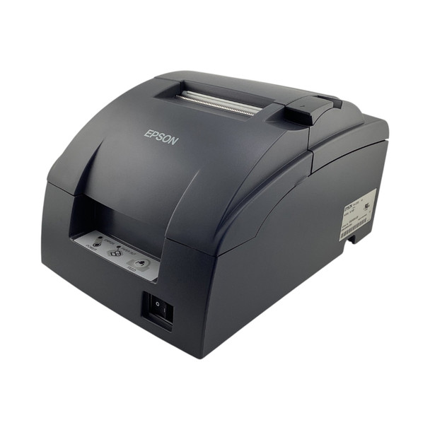 Three-quarters side profile of the Epson TM-U220B impact printer, displaying its compact curved housing, status panel, and power switch position.