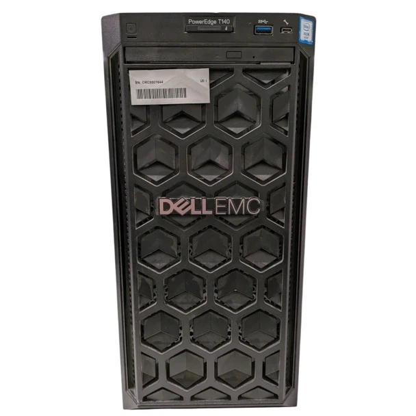 Front-facing view of the black Dell PowerEdge T140 tower server featuring a geometric hexagonal mesh front panel, a central Dell EMC logo badge, optical drive bay, and top-mounted power button, USB ports, and status tag.