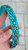 13-16” Orange & Teal Serpentine on Teal