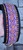 21.5-25" Orange & Purple Design on Amethyst with Giant Black Border