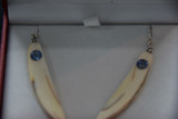 Alaskan Native crafted ivory with round purple/blue natural Tanzanite as center stones of earring set