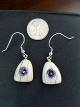 Alaskan Native crafted ivory with a sparkling round shaped natural Tanzanite as center stone of earring set