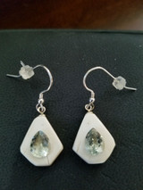 Alaskan Native crafted ivory with pear cut natural green Beryl as center stones of this stunning earring set