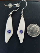 Alaskan Native crafted ivory with a sparkling round purple/blue natural Tanzanite as center stones of earring set
