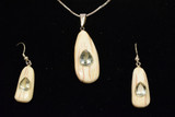 Alaskan Native crafted ivory with pear cut natural green Beryl as center stones of this stunning earring pendant set