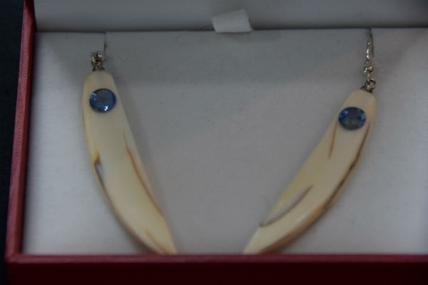 Alaskan Native crafted ivory with round purple/blue natural Tanzanite as center stones of earring set