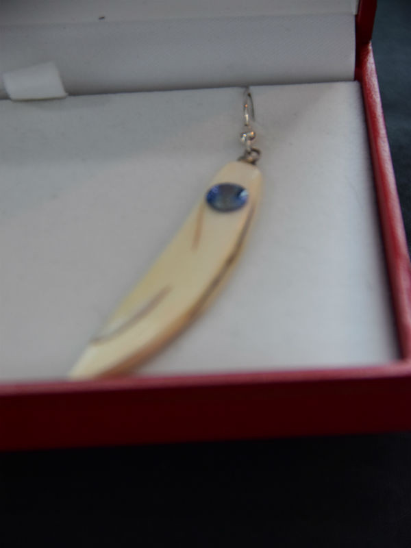 Alaskan Native crafted ivory with round purple/blue natural Tanzanite as center stones of earring set