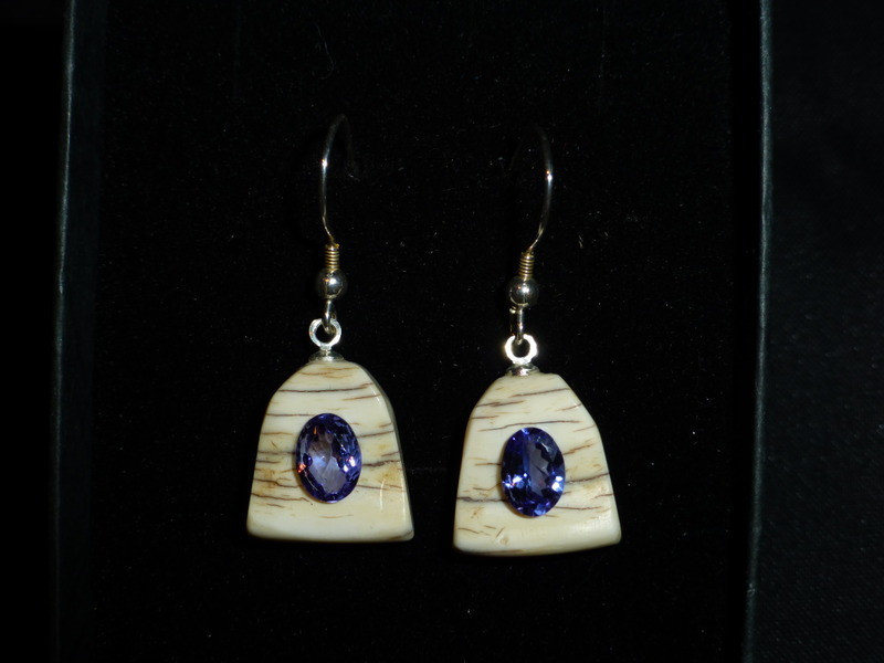 Alaskan Native crafted ivory with oval natural Tanzanite as center stone of earring set