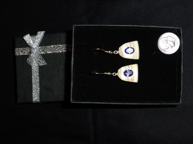 Alaskan Native crafted ivory with oval natural Tanzanite as center stone of earring set