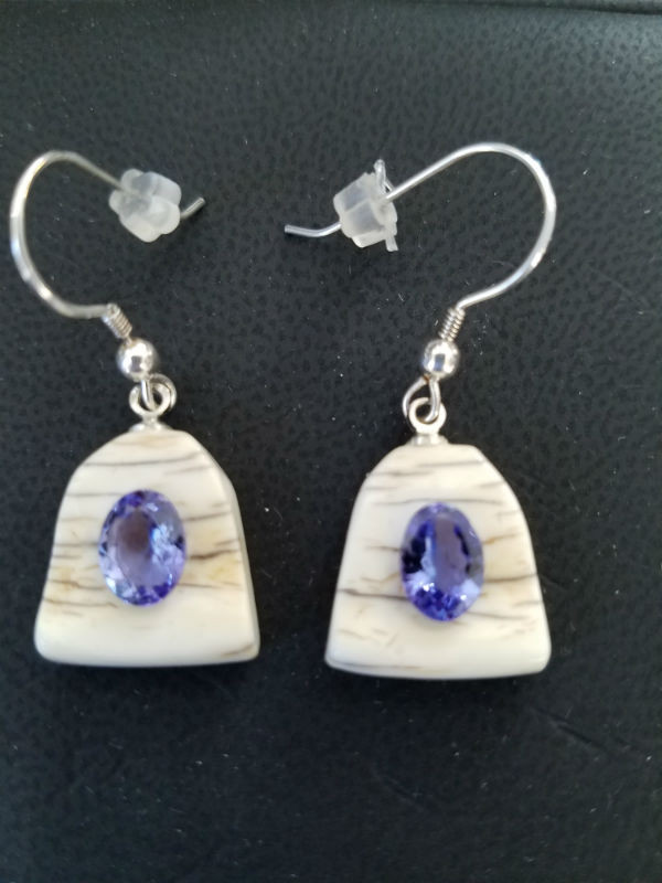 Alaskan Native crafted ivory with oval natural Tanzanite as center stone of earring set