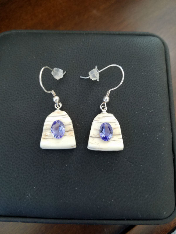 Alaskan Native crafted ivory with oval natural Tanzanite as center stone of earring set