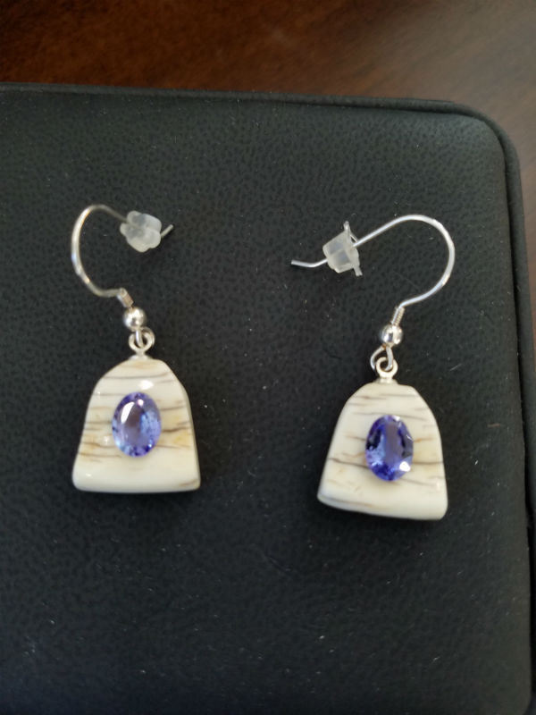 Alaskan Native crafted ivory with oval natural Tanzanite as center stone of earring set