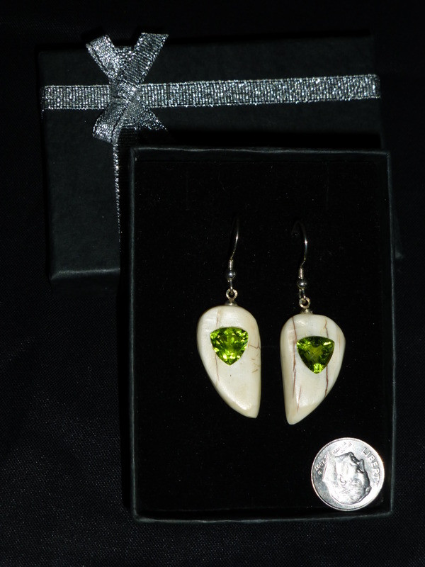 Alaskan Native crafted ivory with natural green Peridot Trillion Cut gems in a unique and stunning earring set