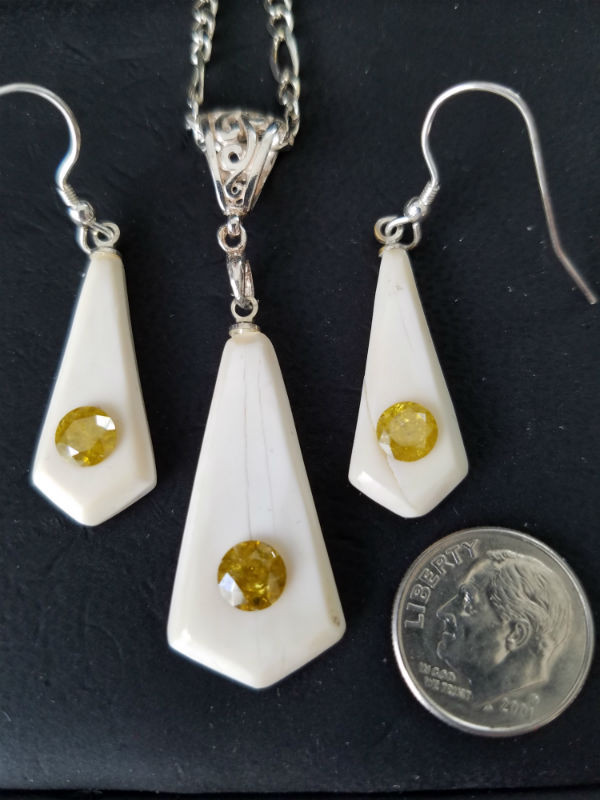 Alaskan Native crafted ivory and natural yellow diamond earring & pendant matching set.
