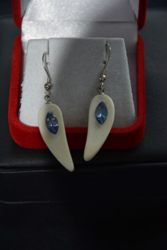 Alaskan Native crafted ivory with sparkling, marquise shaped natural Tanzanite as stunning center stones of this unique earring set