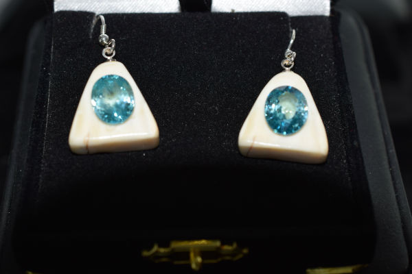 Stunning Alaskan Native crafted ivory with natural Cambodian Blue Zircon oval cut gems in unique earring set