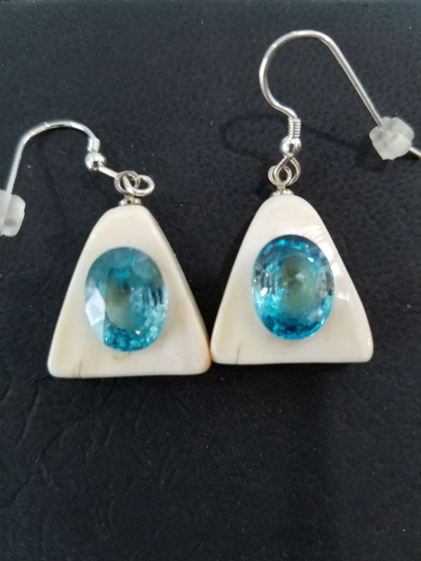Stunning Alaskan Native crafted ivory with natural Cambodian Blue Zircon oval cut gems in unique earring set