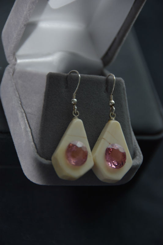 Alaskan Native crafted ivory with large oval natural tourmaline as the stunning center stones of earring set