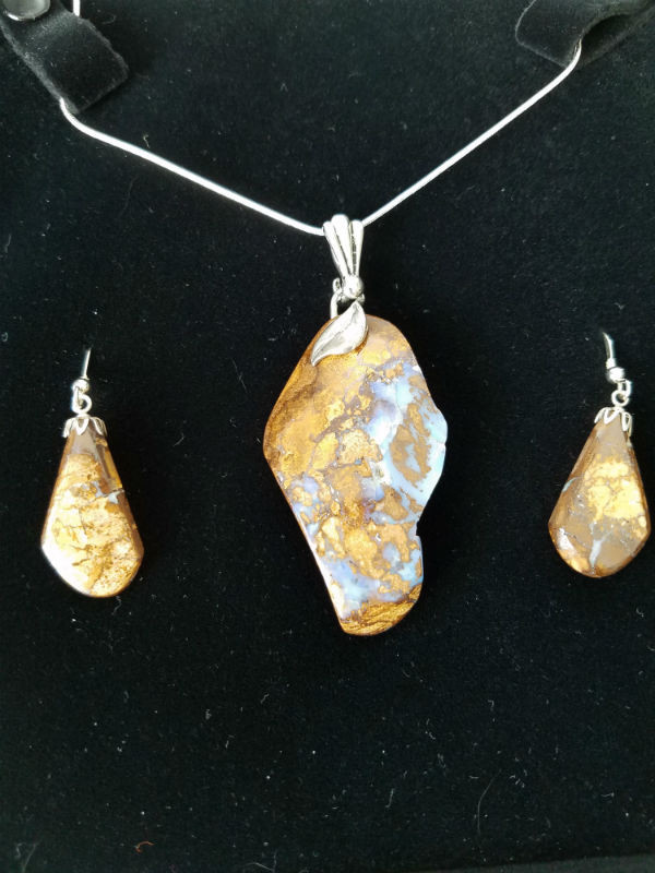 Stunning Alaskan Native crafted Cabochon Collection cut from Australian Boulder Opal to make this unique Jewelry Set