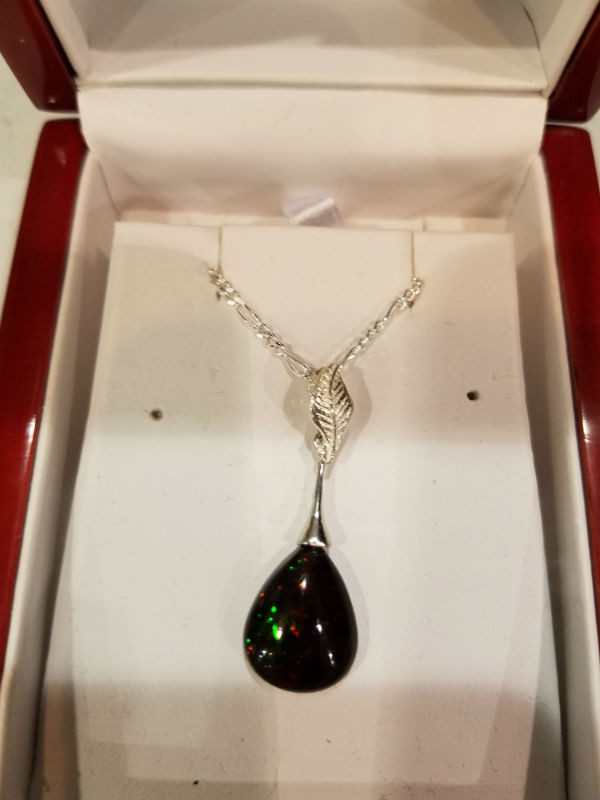 Stunning Alaskan Native crafted Gemstone Pendant created from a finely cut Australian Black Opal to make this uniquely stunning piece of Fine Jewelry for all occasions