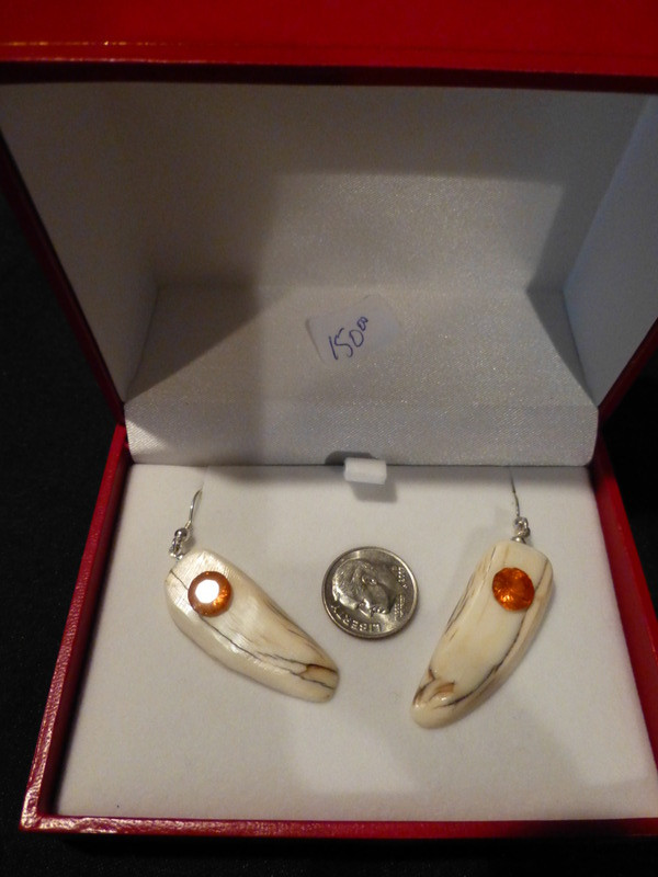 Beautiful, Alaskan Native crafted ivory round, natural Clinohumite as the focal point for this one of a kind, earring set