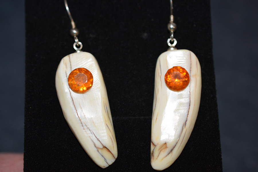 Beautiful, Alaskan Native crafted ivory round, natural Clinohumite as the focal point for this one of a kind, earring set