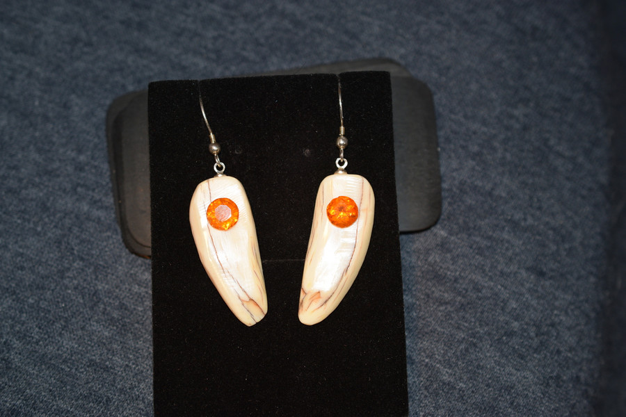 Beautiful, Alaskan Native crafted ivory round, natural Clinohumite as the focal point for this one of a kind, earring set