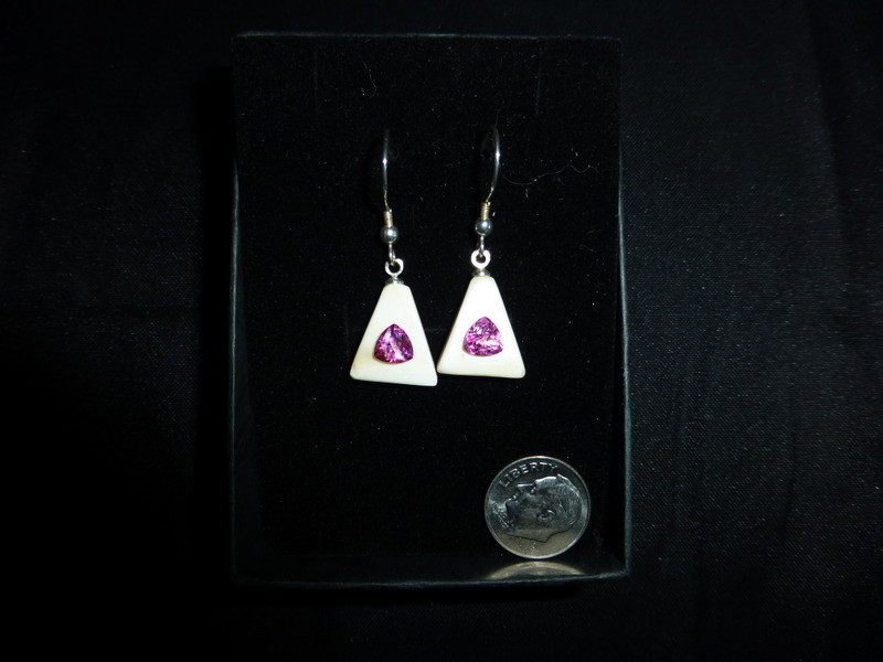 Alaskan Native crafted ivory with featuring natural pink trillion topaz as center gemstones of this unique earring set