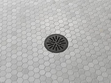 Delta Tile-In Round Shower Drain in Matte Black - DT061411-BL