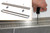Schluter Systems KERDI-LINE 3/4" Perforated Grate With Locking Mechanism Assembly for Tile and Stone Coverings 64" Length in Brushed Stainless Steel - KL1BL19EB160
