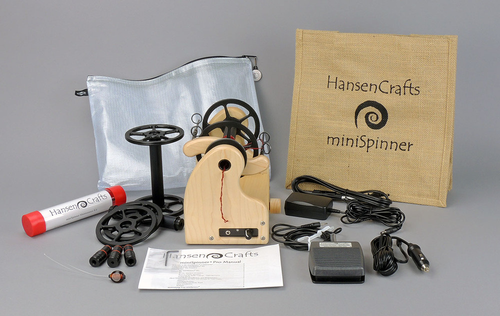 The Ultimate E-Spinner, the HansenCrafts miniSpinner Pro, in Maple! The Pro includes 2 additional HansenCrafts Standard or 3 additional HansenCrafts Lace bobbins, gear bag, maintenance kit, and orifice reducer set.