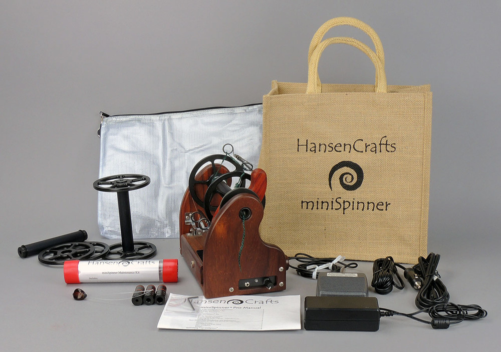 The Ultimate E-Spinner, the HansenCrafts miniSpinner Pro, in Padauk! The Pro includes 2 additional HansenCrafts Standard or 3 additional HansenCrafts Lace bobbins, gear bag, maintenance kit, and orifice reducer set.