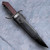 bowie knife with leather sheath rosewood handle