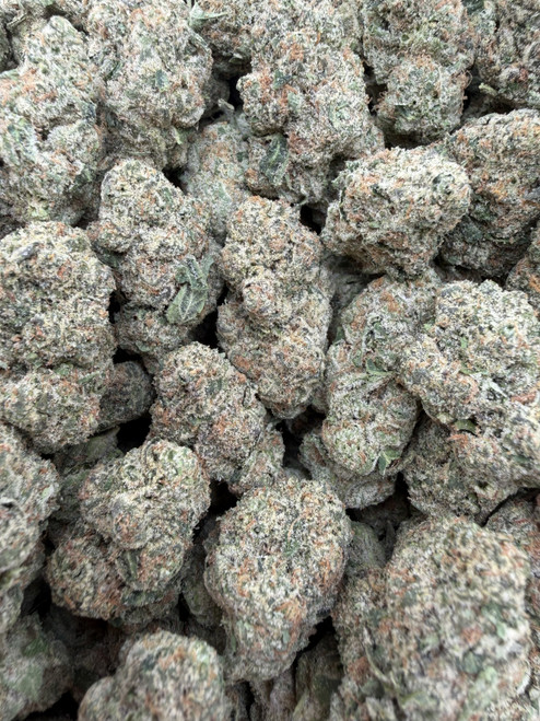 Darth Vader is a premium indica featuring dense, chunky buds drenched in a thick blanket of sparkling trichomes, highlighted by deep forest-green tones and vibrant orange pistils that create striking top-shelf bag appeal. Its rich terpene profile combines bold notes of earthy pine, pungent diesel, and sweet herbal spice for a smooth, flavorful smoke with a lingering gassy finish. Known for its deeply calming effects, Darth Vader delivers a wave of euphoric relaxation that melts away stress while providing full-body comfort, making it an excellent choice for evening use, unwinding after a long day, or settling in for a restful night's sleep.