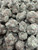 Midnight Mango is a premium top-shelf cultivar featuring dense, hand-trimmed buds drenched in a thick layer of shimmering trichomes. Rich emerald-green flowers with subtle violet hues and vibrant orange pistils create exceptional bag appeal, giving each nug a frosty, eye-catching finish. Its terpene profile delivers a delicious blend of ripe mango, sweet tropical fruit, creamy earth, and subtle notes of herbal spice with a smooth, flavorful finish. The experience begins with a calming sense of euphoria that gradually settles into deep physical relaxation, making Midnight Mango an excellent choice for unwinding after a long day, kicking back in the evening, or enjoying a slow, peaceful session with rich, tropical flavor.