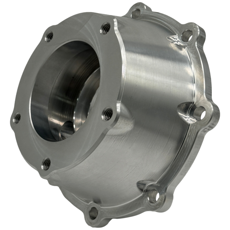 Our 205 Billet Output Housing is machined in-house from billet 6061-T6 aluminum. We have increased oiling to the rear output bearings with a larger oil collector and have enlarged the oil transfers into the rear housing.