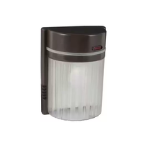 15W Outdoor LED Wall Pack Light in Bronze finish mounted on exterior wall. 15W Outdoor LED Wall Pack Light in Bronze finish mounted on exterior wall.